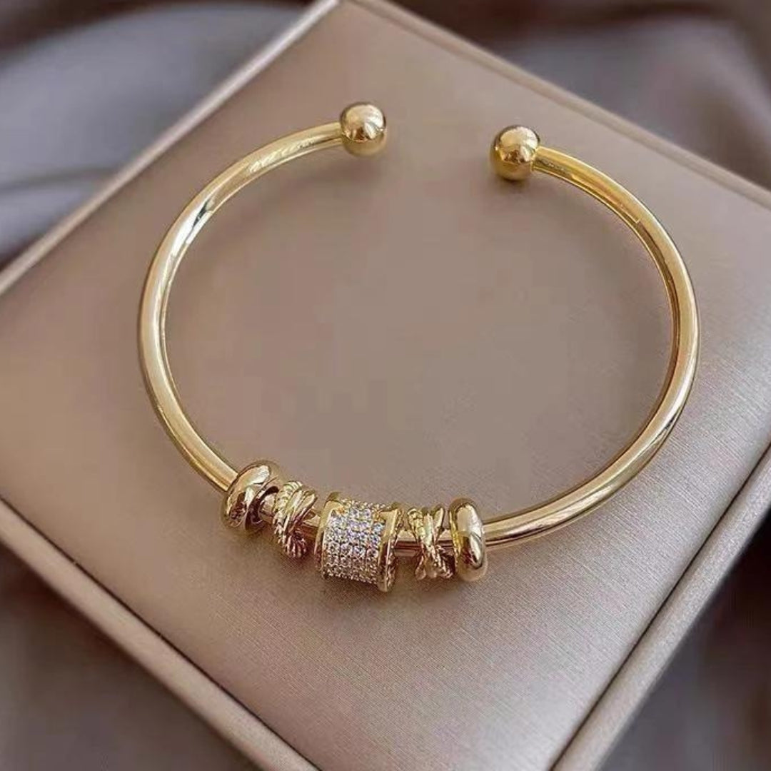 Adjustible Bracelet with Golden Charms