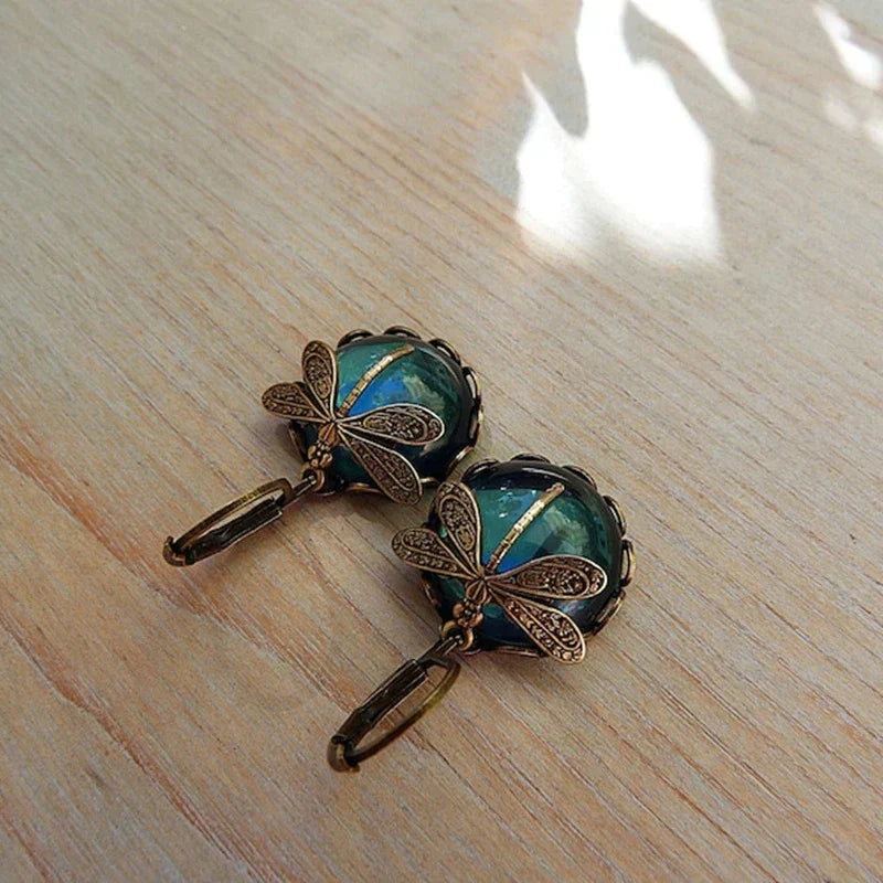 Antique Gold Dragonfly Earrings with a Spherical Design