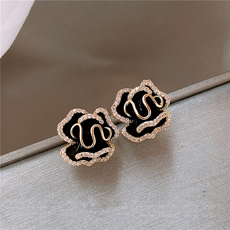 Gold Lotus Earrings in Elegant Black